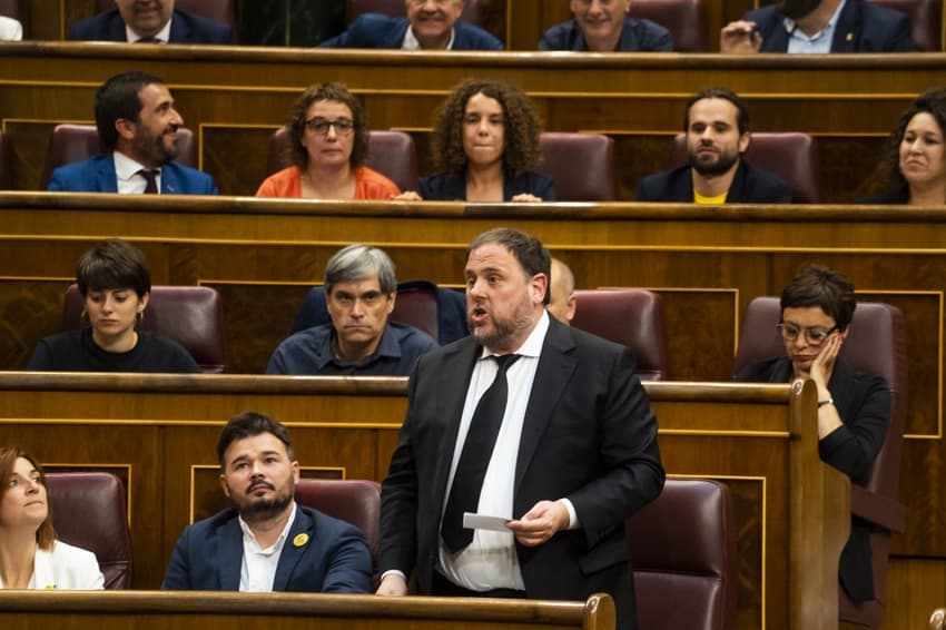 Spanish parliament suspends four jailed Catalan MPs