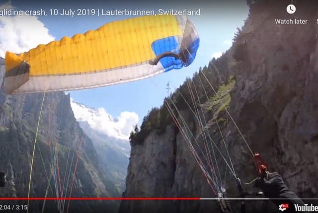 WATCH: American paraglider crashes into cliff face in Swiss Alps
