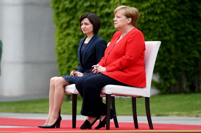 Merkel stays seated for second time after shaking spells