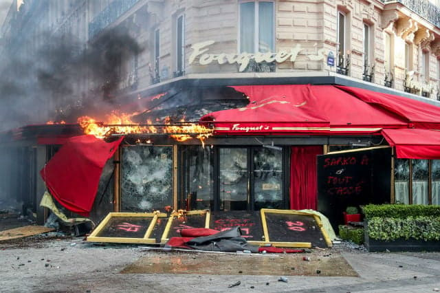 Feted Paris bistro trashed by yellow vests to reopen