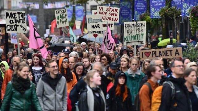 In Pictures: Tens of thousands strike for the climate in Sweden