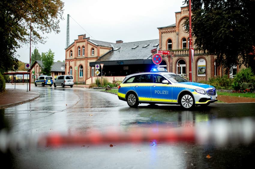 Major train delays hit western Germany as police hunt murder suspect
