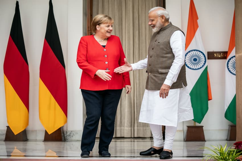 Merkel braves dense Delhi smog for fourth Indian visit
