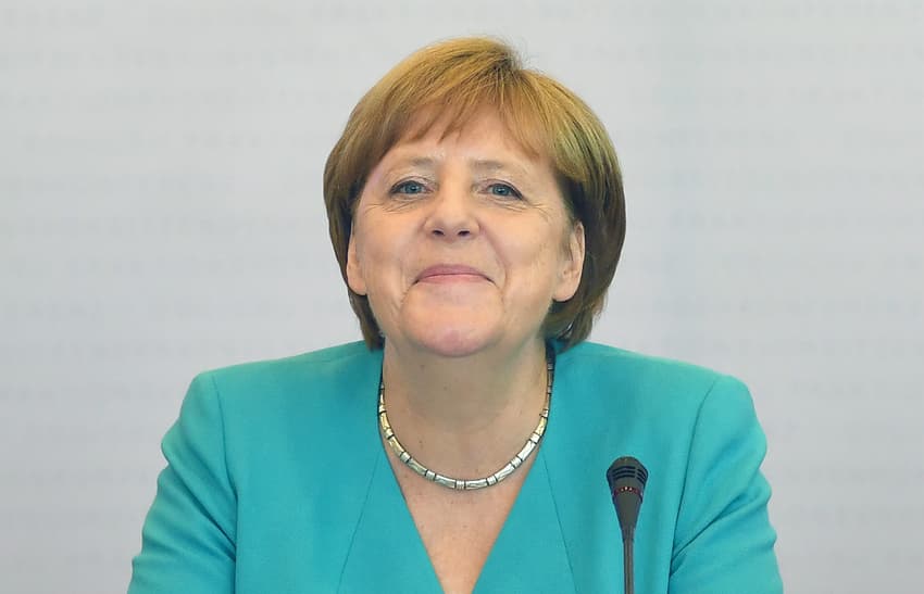 Behind Berlin Wall Merkel dreamt of US road trip 'listening to Springsteen'