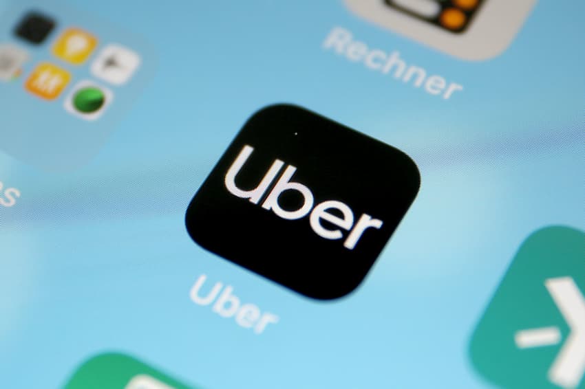German court bans Uber from offering rides via hire cars