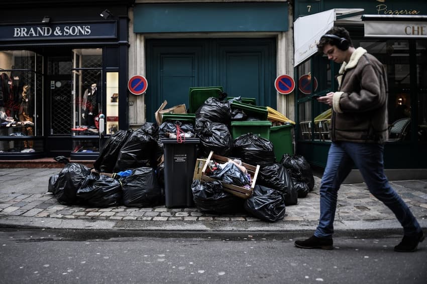 Rubbish piles up on Paris streets as pension strikes hit waste collection
