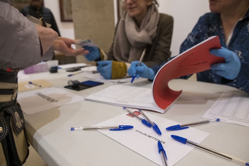 Anxious France defies coronavirus to vote in local elections
