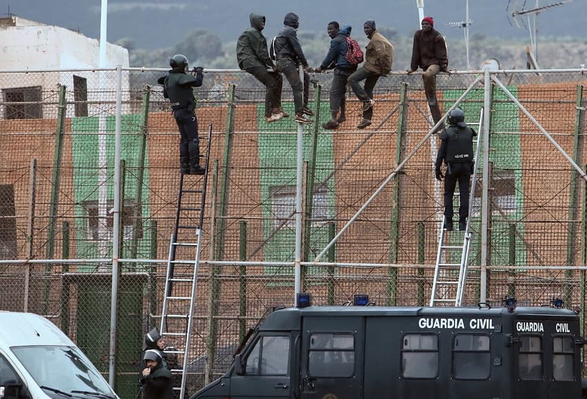 Dozens scale border fence into Spain's North African enclave Melilla
