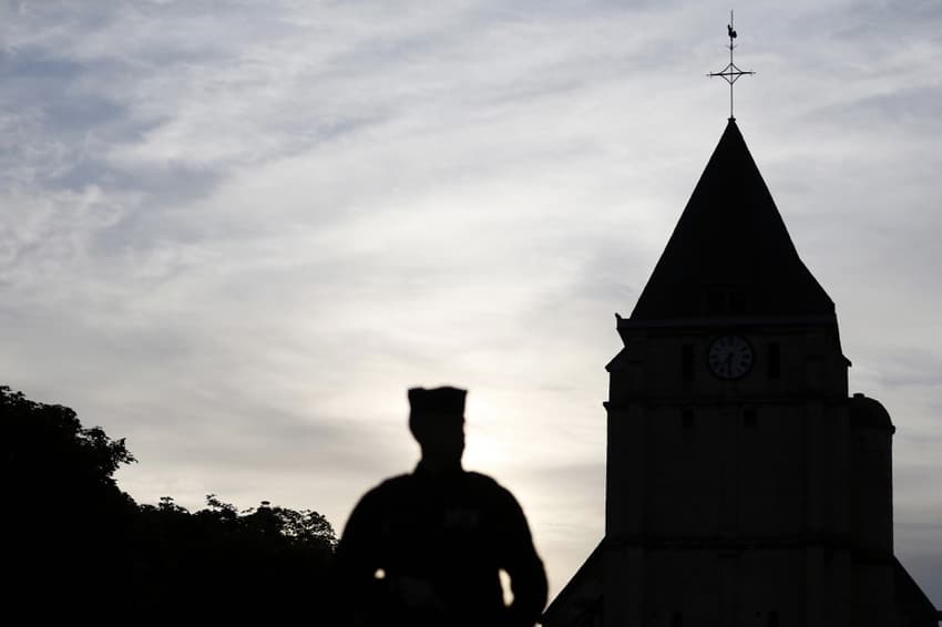 Police catch Paris church holding secret Easter service: source