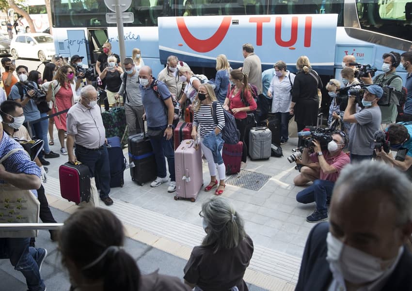 'So glad to be here': Planeload of Germans become first tourists to arrive in Spain under post-lockdown pilot test
