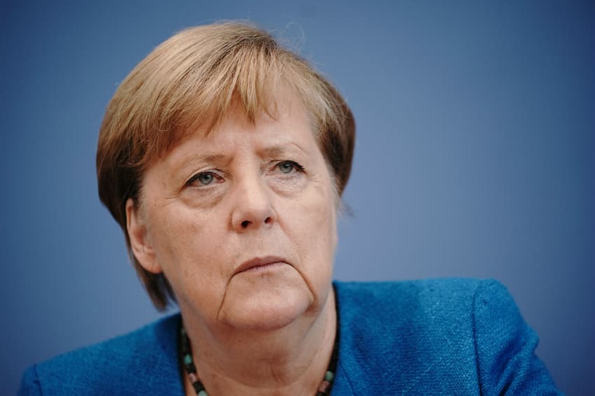 Merkel condemns 'shameful' coronavirus parliament protest