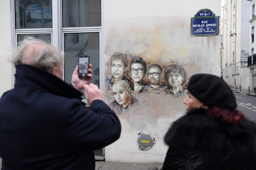 France delays Charlie Hebdo trial after two more defendants test positive for Covid-19