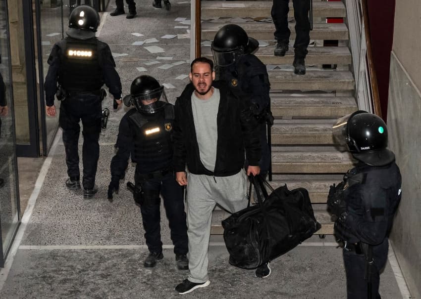 Police arrest rapper holed up in Catalan university to avoid jail for tweets