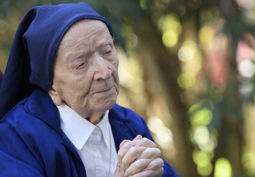 'A glass of wine a day': French nun turns 117 after surviving Covid