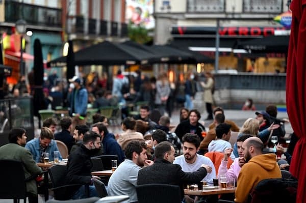 IN PICS: Madrid becomes haven for fun-starved Europeans but locals can't leave