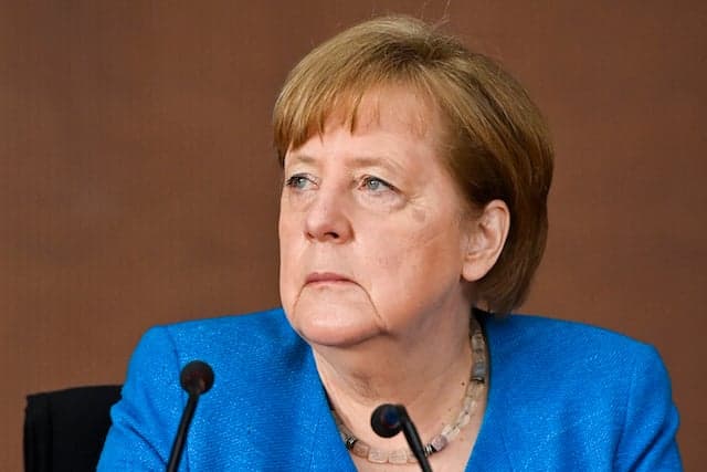 Merkel defends Germany's new strict Covid measures