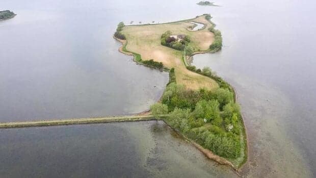 Island for sale in Denmark with own farm, wood and pond