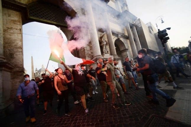 Italian police raid Covid health pass protesters 'planning violence'