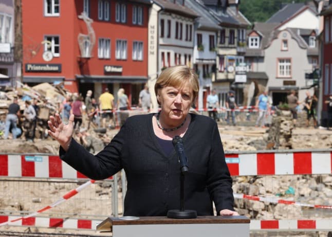 Merkel defends German flood alerts as death toll climbs