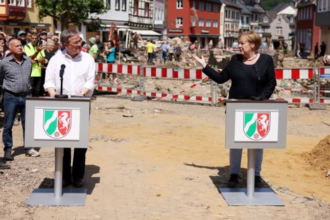 POLITICS: Frontrunner to succeed Merkel as chancellor on back foot after flood disaster