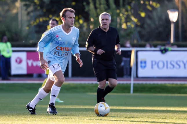 VIDEO: French president Macron pulls on boots for charity football game