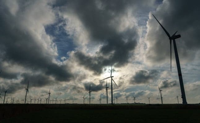 Why is Germany running behind schedule on its wind energy rollout?