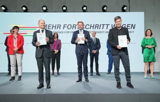 Germany's 'traffic light' parties sign coalition agreement in Berlin
