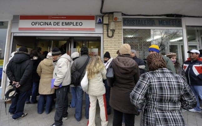 Spain's unemployment rate posts record fall in 2021