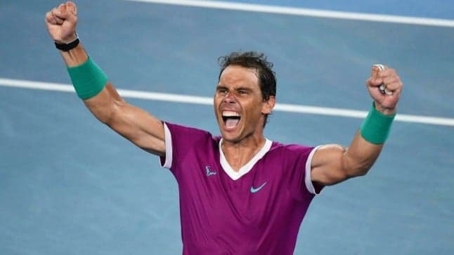 Nadal comes from two sets down to make history with record 21st Slam