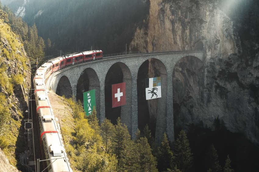 Where in Europe can you get to by night train from Switzerland?