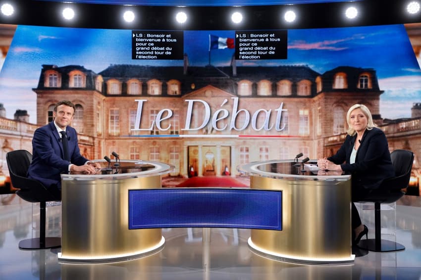 Macron and Le Pen clash on debt, Russia and Islam in live debate