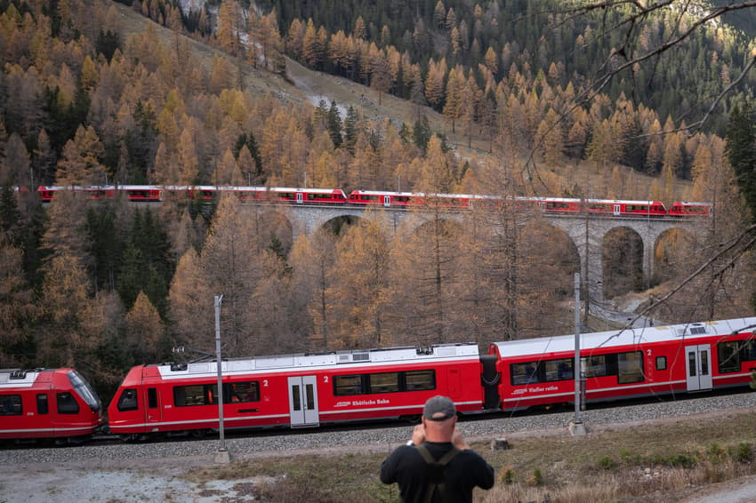IN PICTURES: World's longest passenger train winds through Swiss Alps