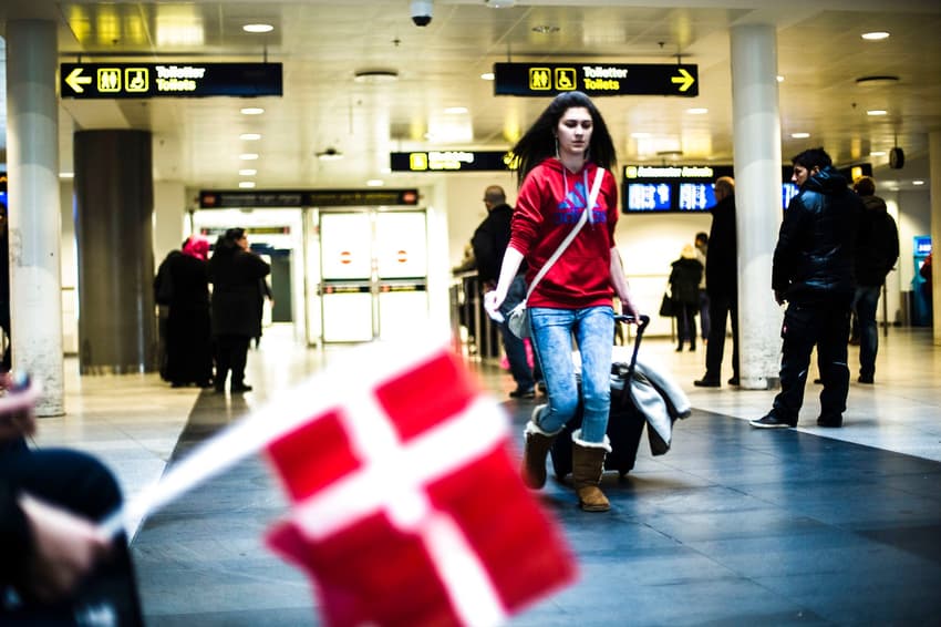 How many people moved to Denmark last year?