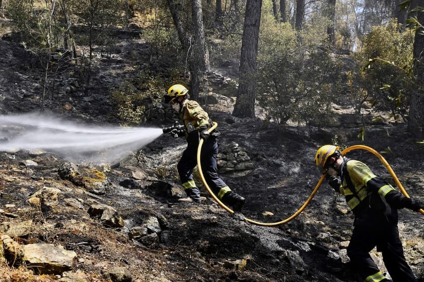 Spanish firefighters battle early spring wildfire