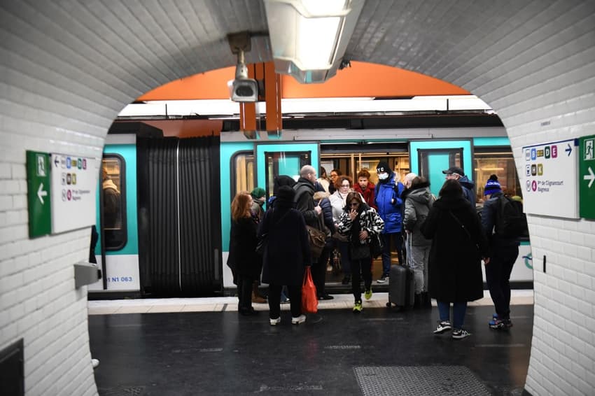Woman dies on Paris Metro after getting coat caught in doors