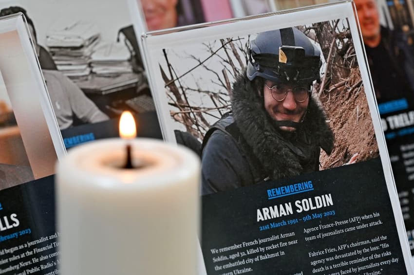 Minute's silence for French journalist killed in Ukraine