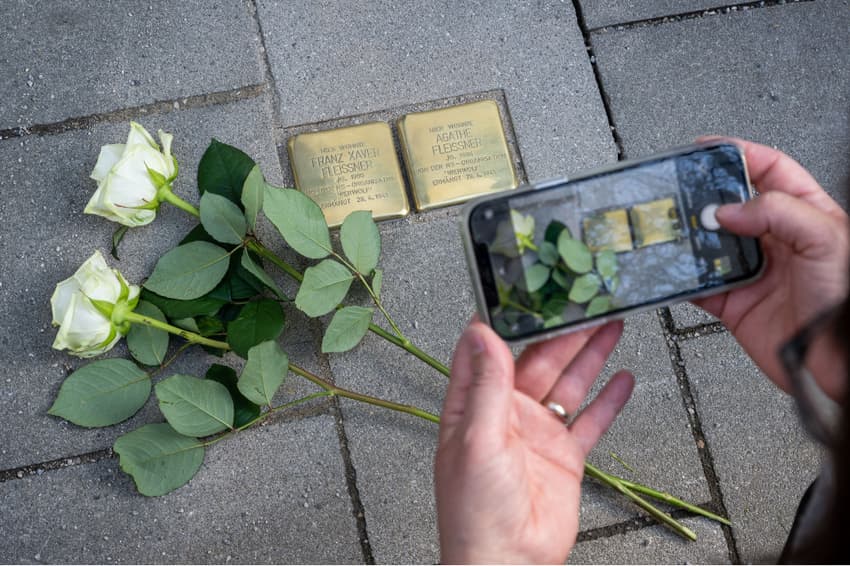 Stolpersteine: Holocaust project marks 100,000-plaque milestone in Germany