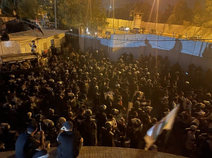 Swedish diplomatic staff 'safe' after protesters torch embassy in Baghdad