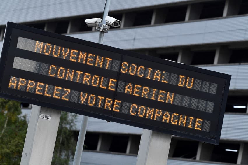 French airports cancel flights over new air traffic controllers' strike