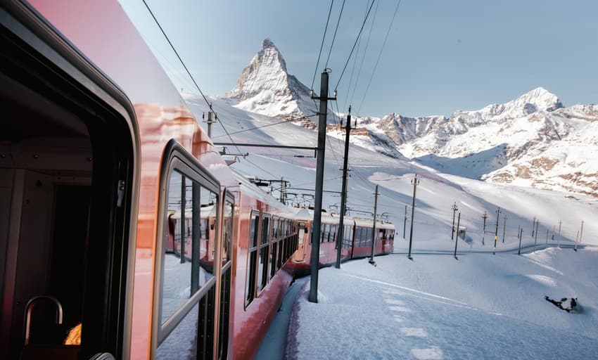 Can I take my skis on the train in Switzerland?