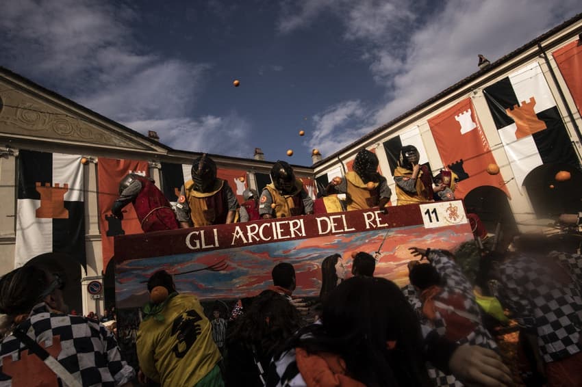 Why does the Italian town of Ivrea hold a ‘battle of the oranges’?