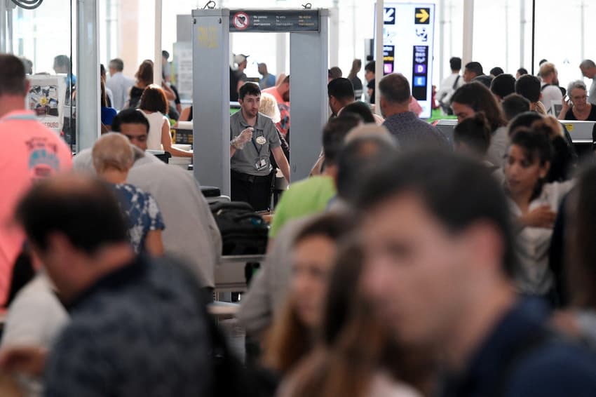 When do Spain's new airport rules for liquids and laptops begin?
