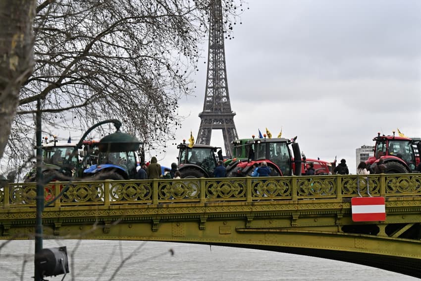 Angry French farmers bring tractor convoys to Paris