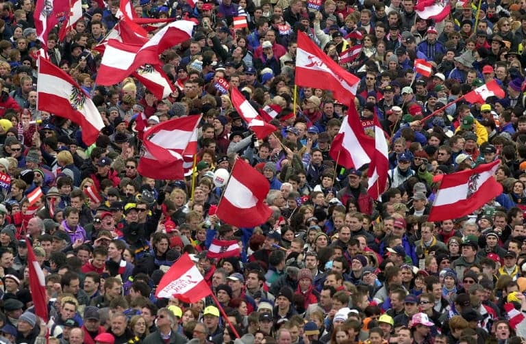 Why does Austria have two different official flags?