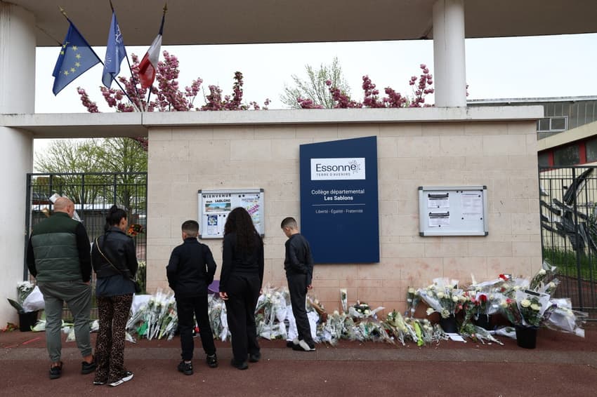 Four charged over French schoolboy's killing