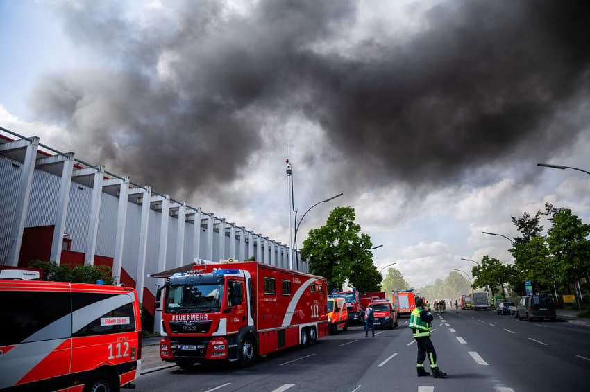 Warning of toxic smoke after fire breaks out at Berlin factory
