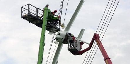 Couple rescued from plane stuck in Bavarian power lines