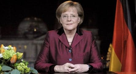Merkel tells Germans to unite to beat crisis