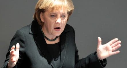 Merkel defends Berlin’s crisis management