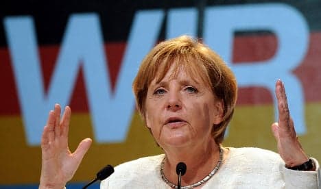 Merkel demands equal pay for women